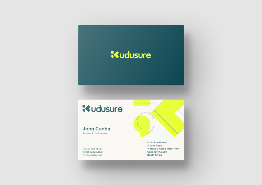 Kudusure business card concept featuring the geometric lime symbol and deep teal wordmark